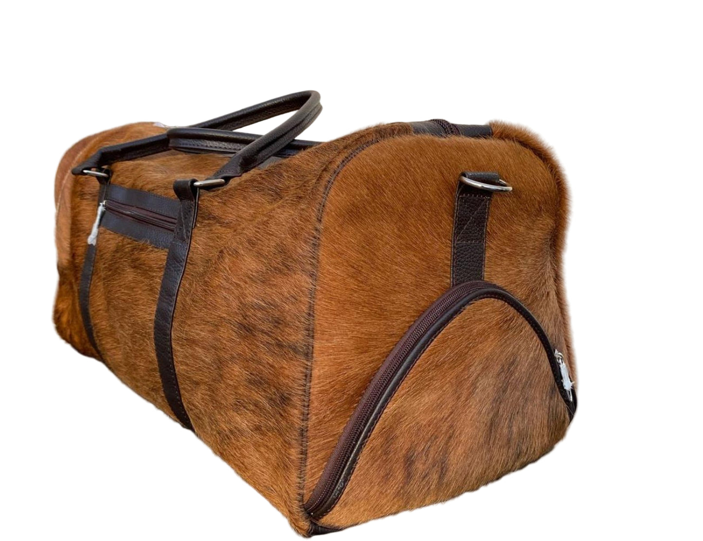 Brown leather duffel bag with black zippers on a tiled floor.