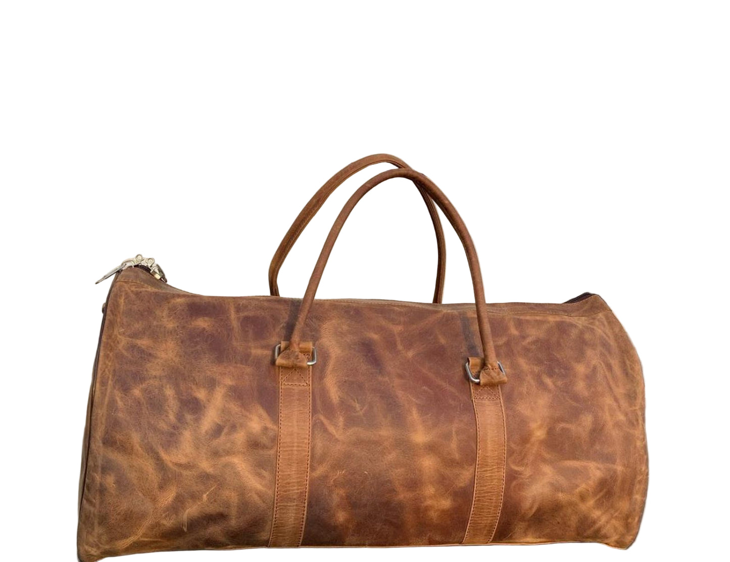 Brown leather duffel bag on a stone pavement