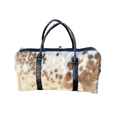 Luxury Brown & White Cowhide Duffel – Premium Travel Companion