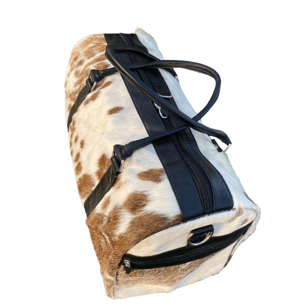 Luxury Brown & White Cowhide Duffel – Premium Travel Companion