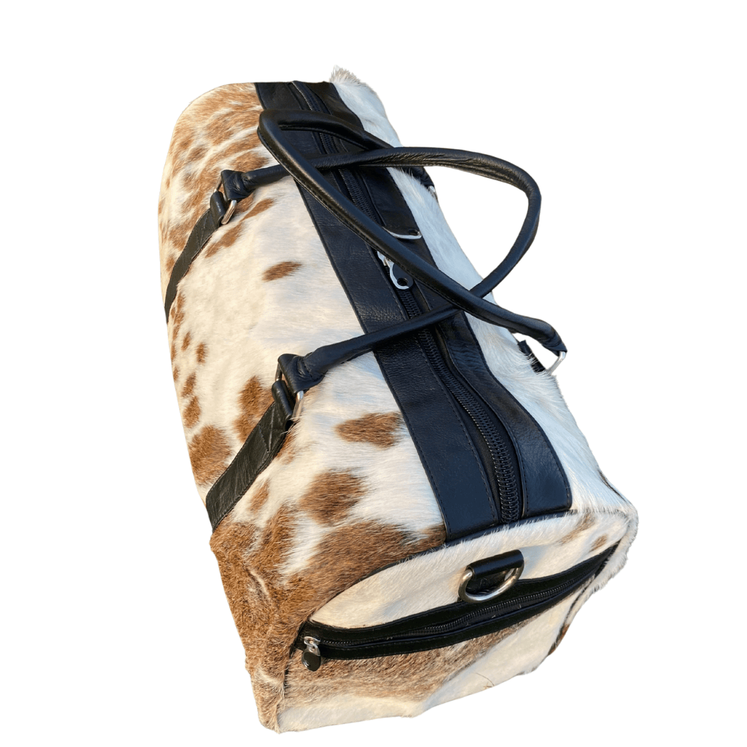Luxury Brown & White Cowhide Duffel – Premium Travel Companion