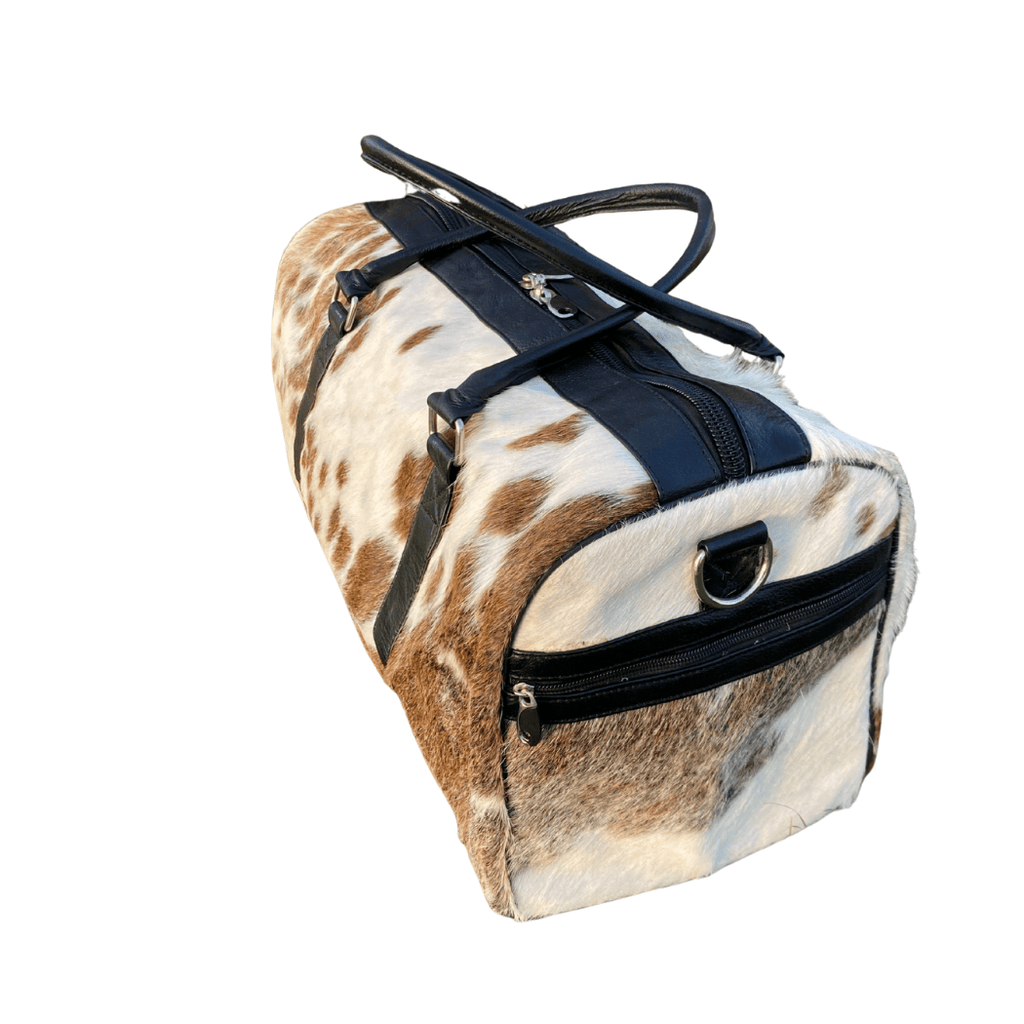 Luxury Brown & White Cowhide Duffel – Premium Travel Companion