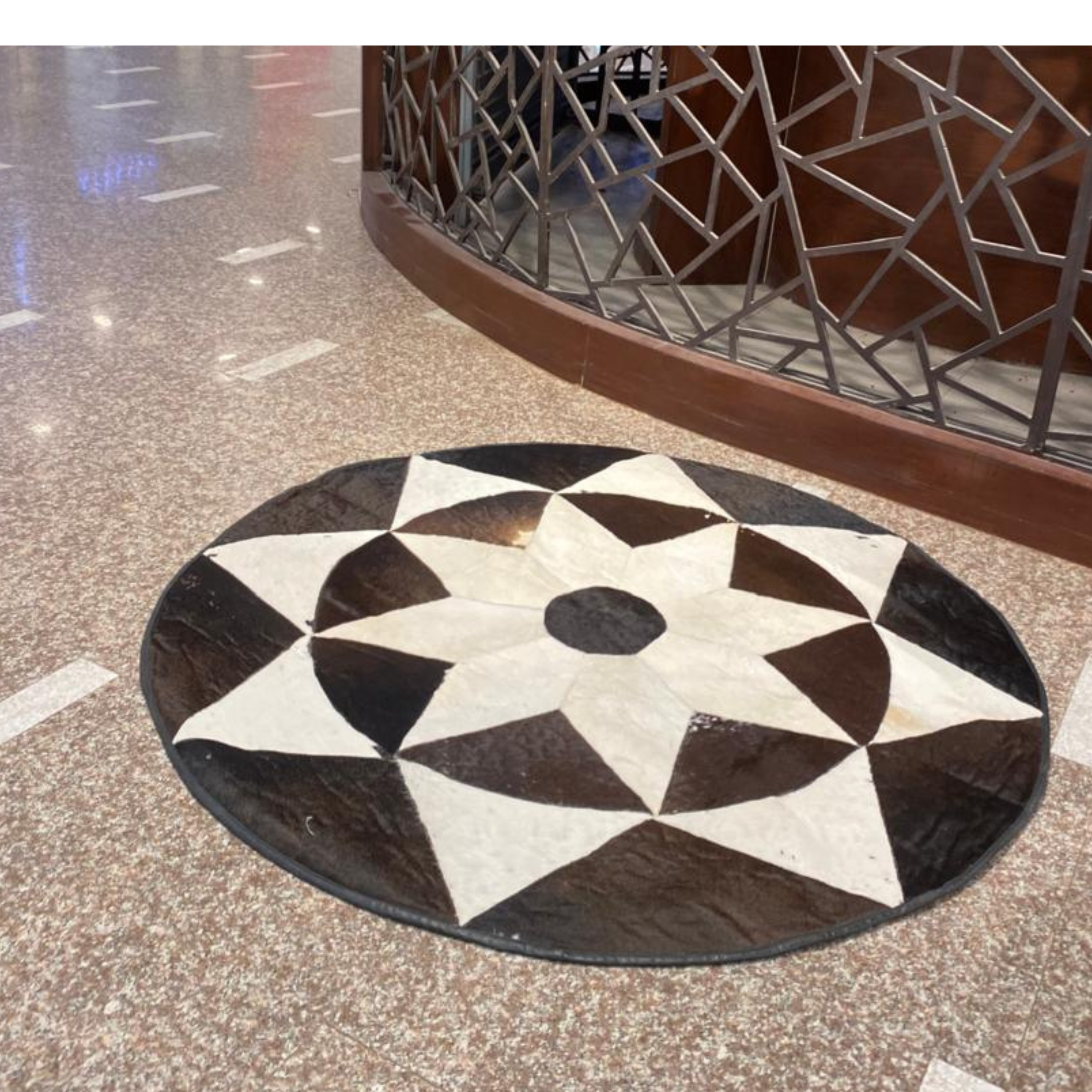 Black & White Round Cowhide Rug