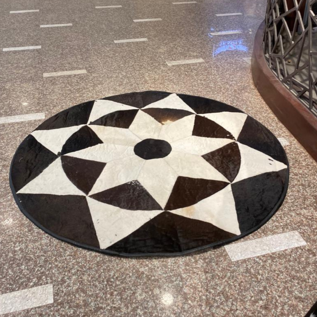 Black & White Round Cowhide Rug