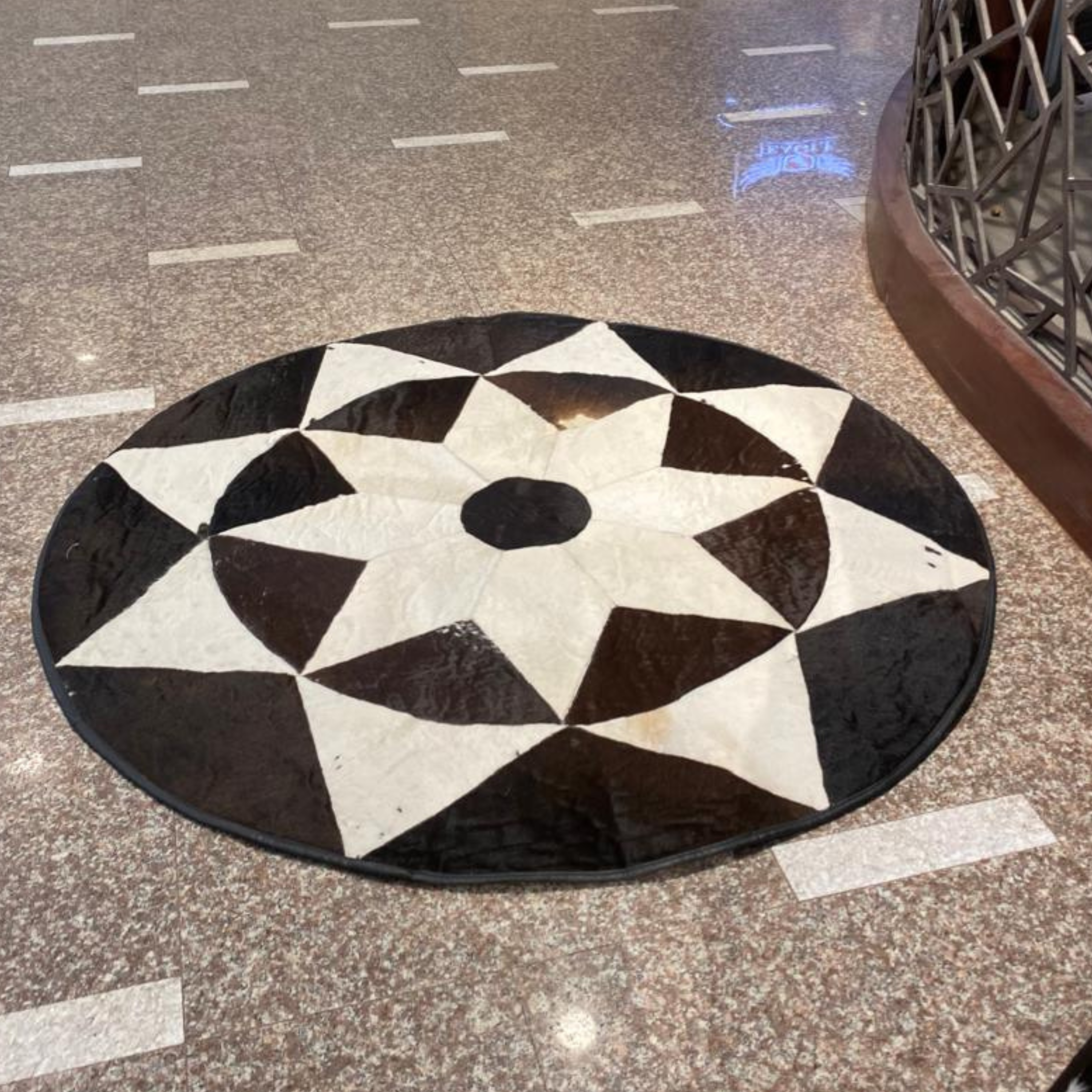 Black & White Round Cowhide Rug