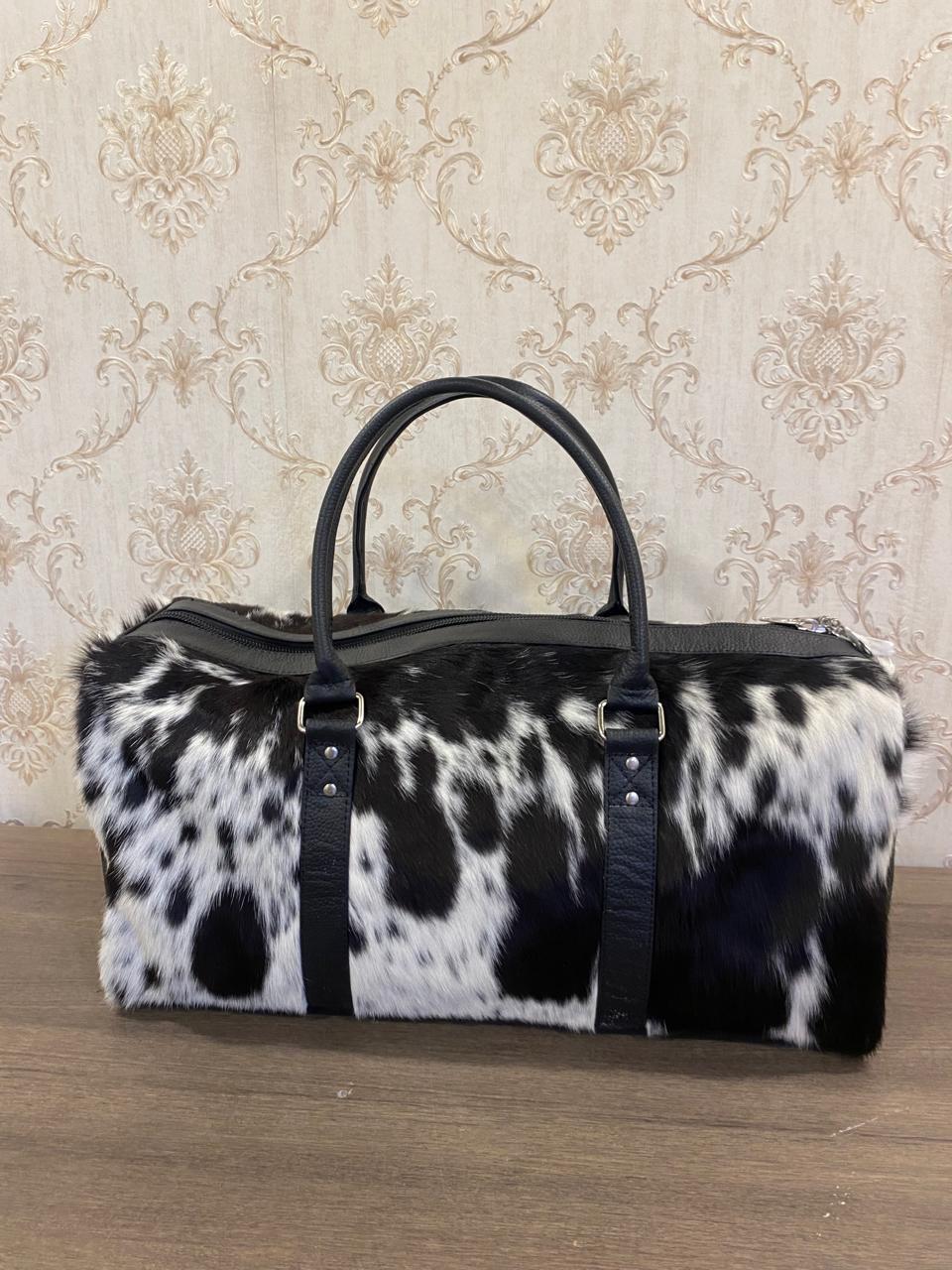 Onyx – Black & White Cowhide Duffel Bag