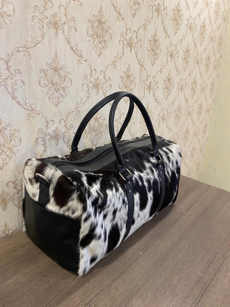 Onyx – Black & White Cowhide Duffel Bag