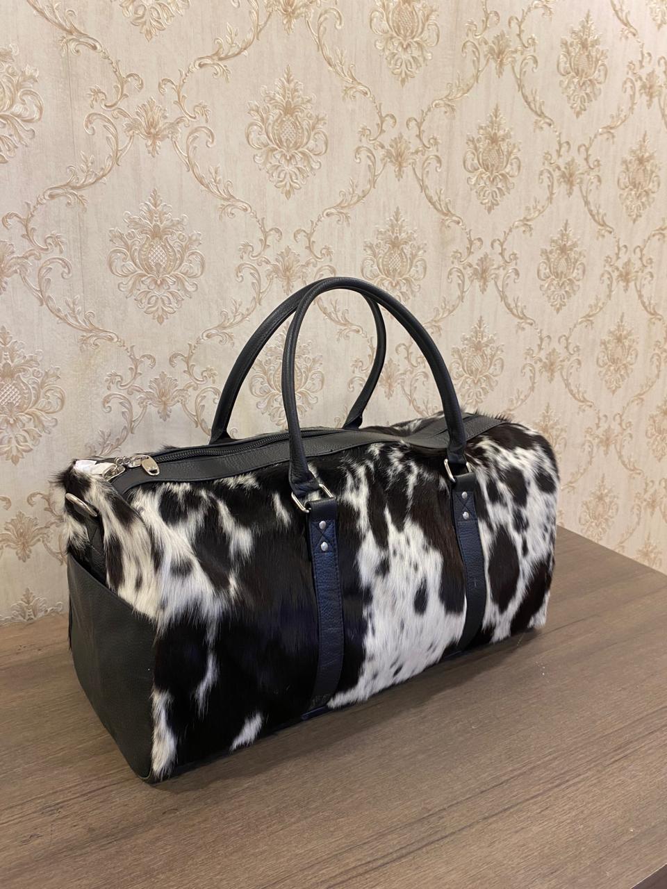 Onyx – Black & White Cowhide Duffel Bag