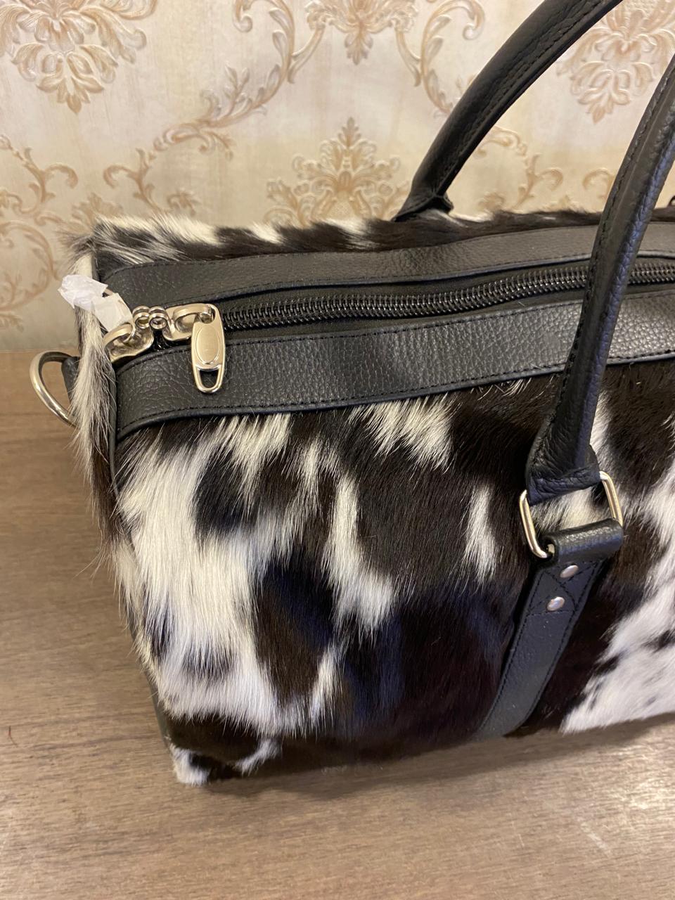 Onyx – Black & White Cowhide Duffel Bag