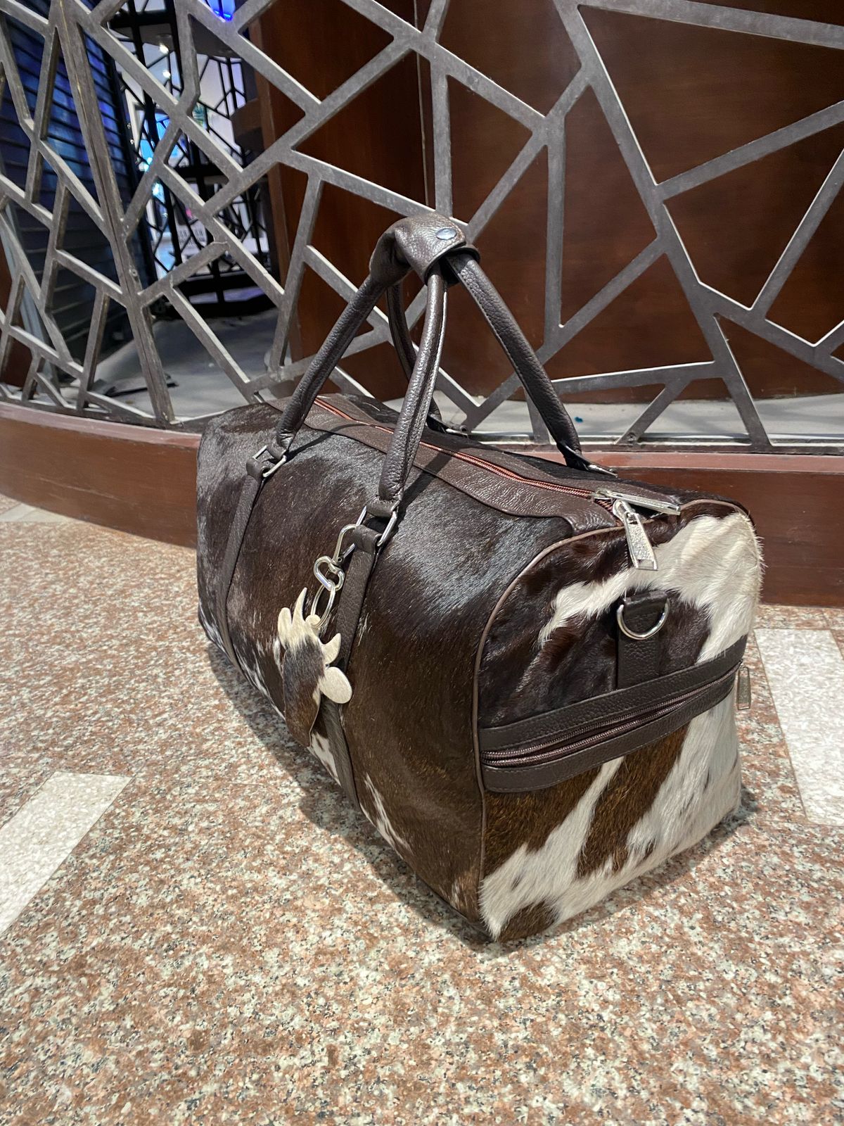 Cognac – Brown & White Cowhide Duffel Bag