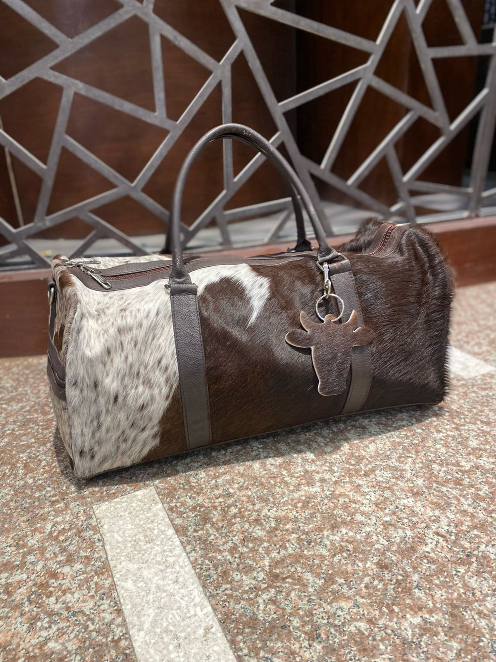 Cognac – Brown & White Cowhide Duffel Bag
