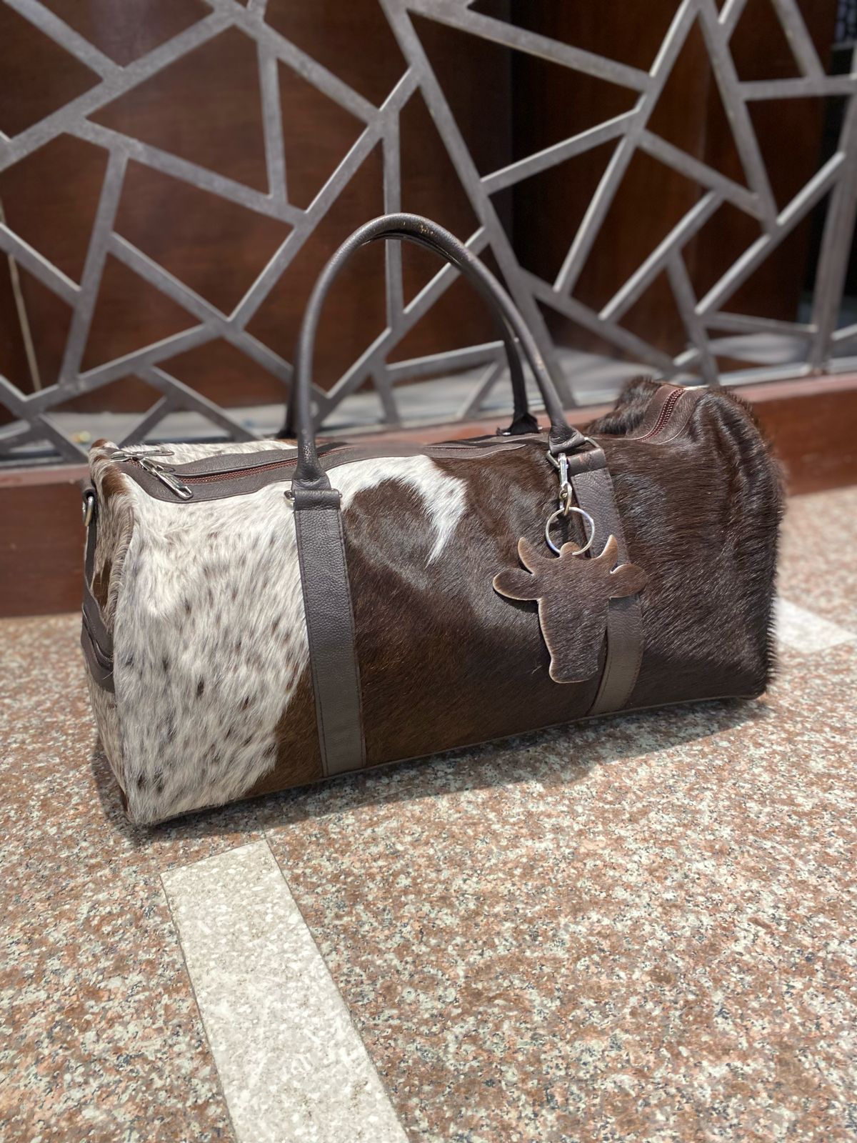 Cognac – Brown & White Cowhide Duffel Bag