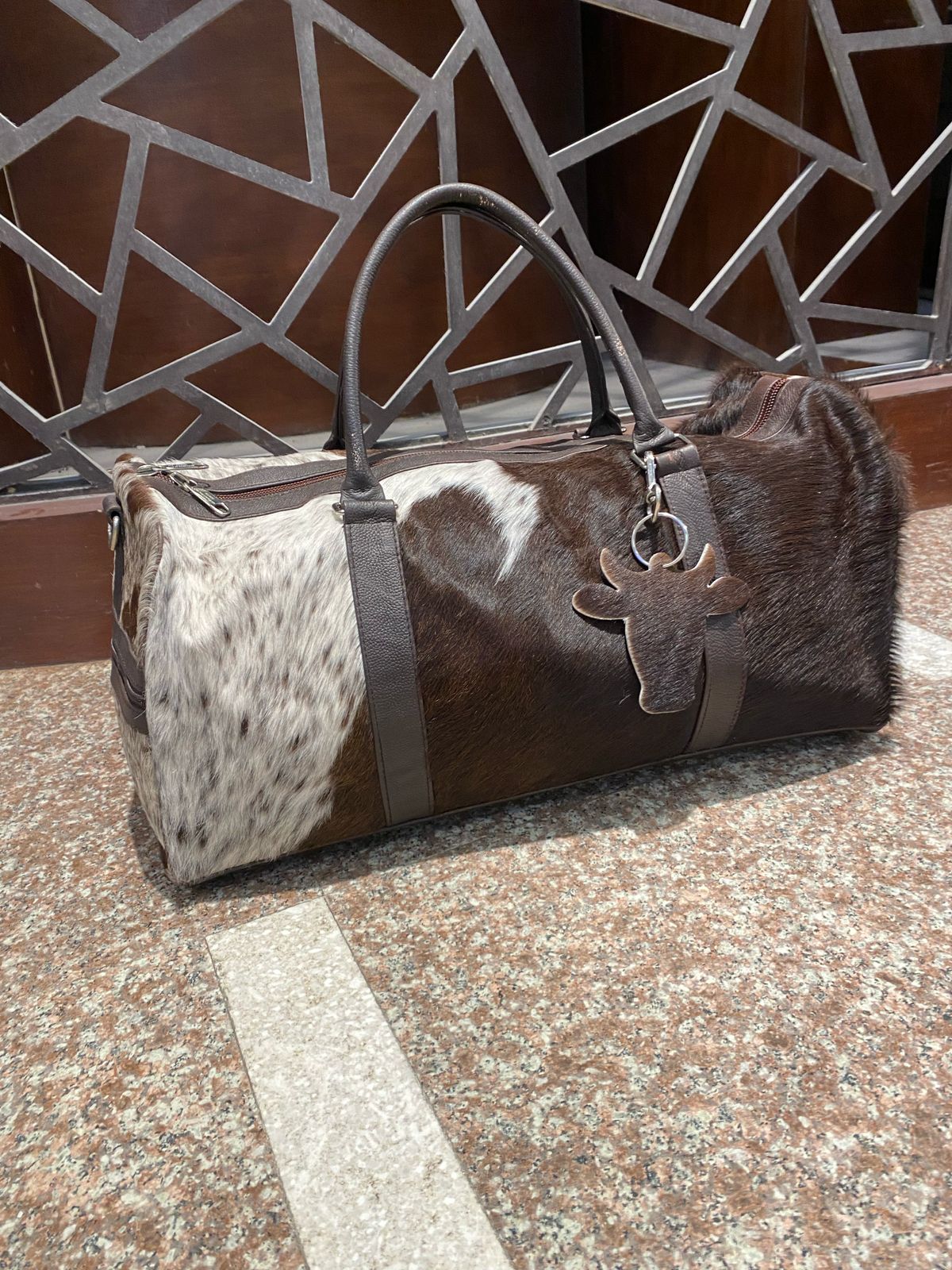 Cognac – Brown & White Cowhide Duffel Bag