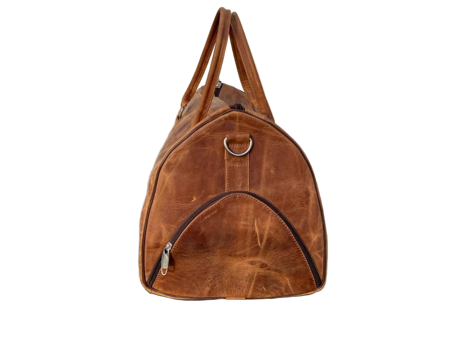Brown leather duffel bag on a reflective floor with a neutral wall background